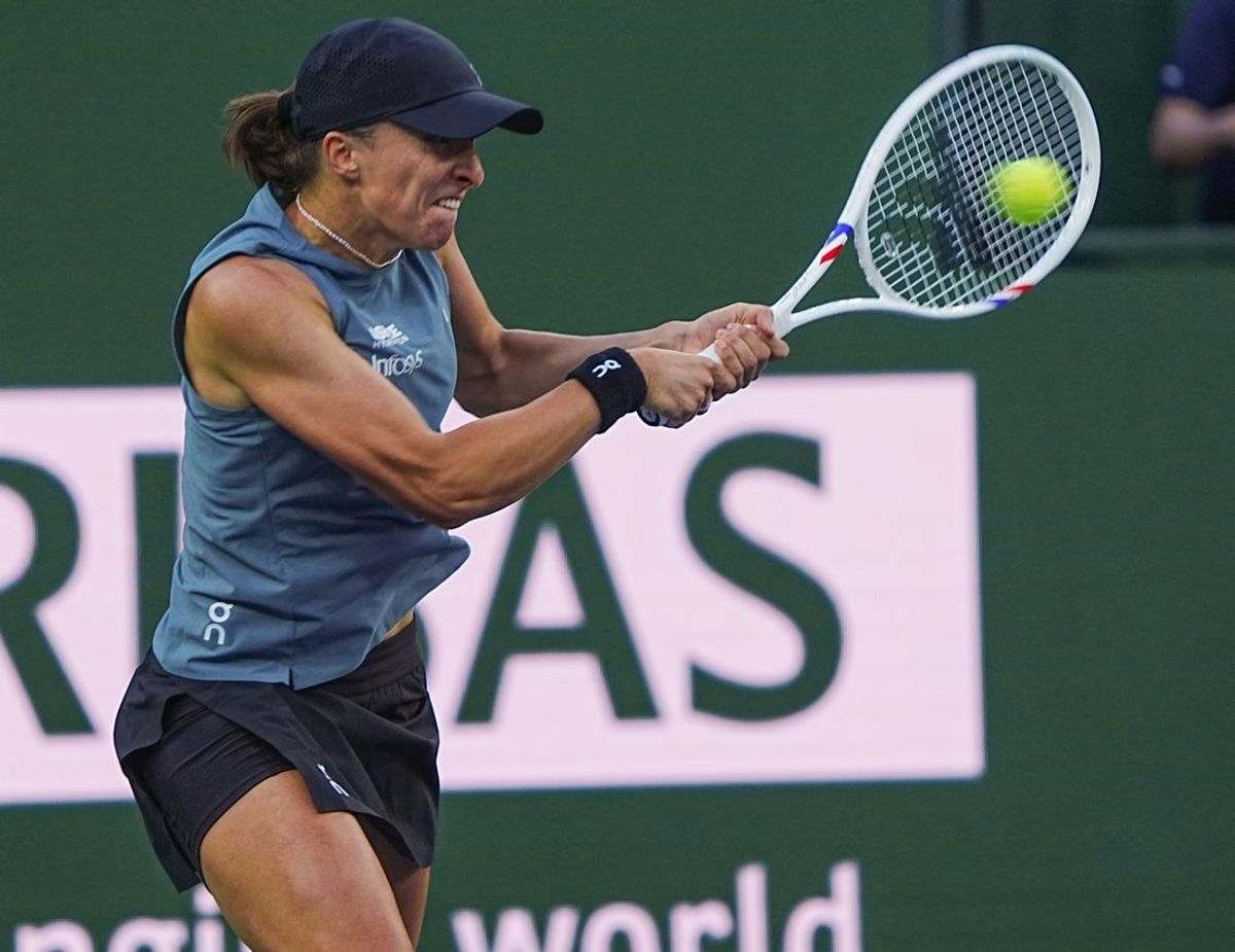 Iga Swiatek hits a shot during her win over Maria Sakkari in round 3 of the women’s singles at the BNP Paribas Open in Indian Wells, Calif., March 9, 2026.