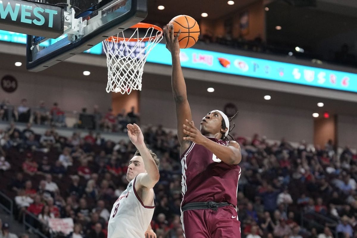 March 9, 2026; Las Vegas, NV, USA; Santa Clara Broncos forward Elijah Mahi (8) shoots the basketball against Saint Mary's Gaels guard Rory Hawke (8) during the first half at Orleans Arena. Mandatory Credit: Kyle Terada-Imagn Images