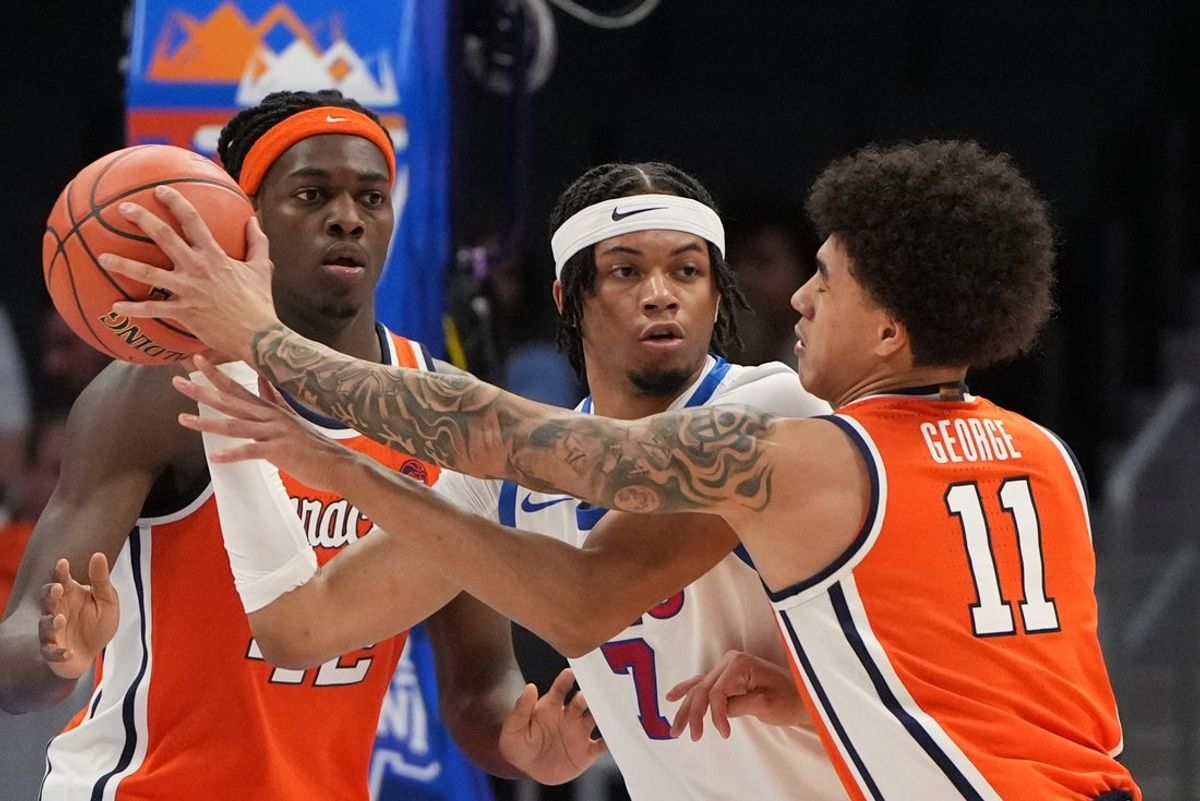 Mar 10, 2026; Charlotte, NC, USA; Syracuse Orange guard Naithan George (11) knocks the ball from Southern Methodist University Mustangs forward Jermaine O'Neal Jr. (7) in the first half at Spectrum Center. Mandatory Credit: Bob Donnan-Imagn Images