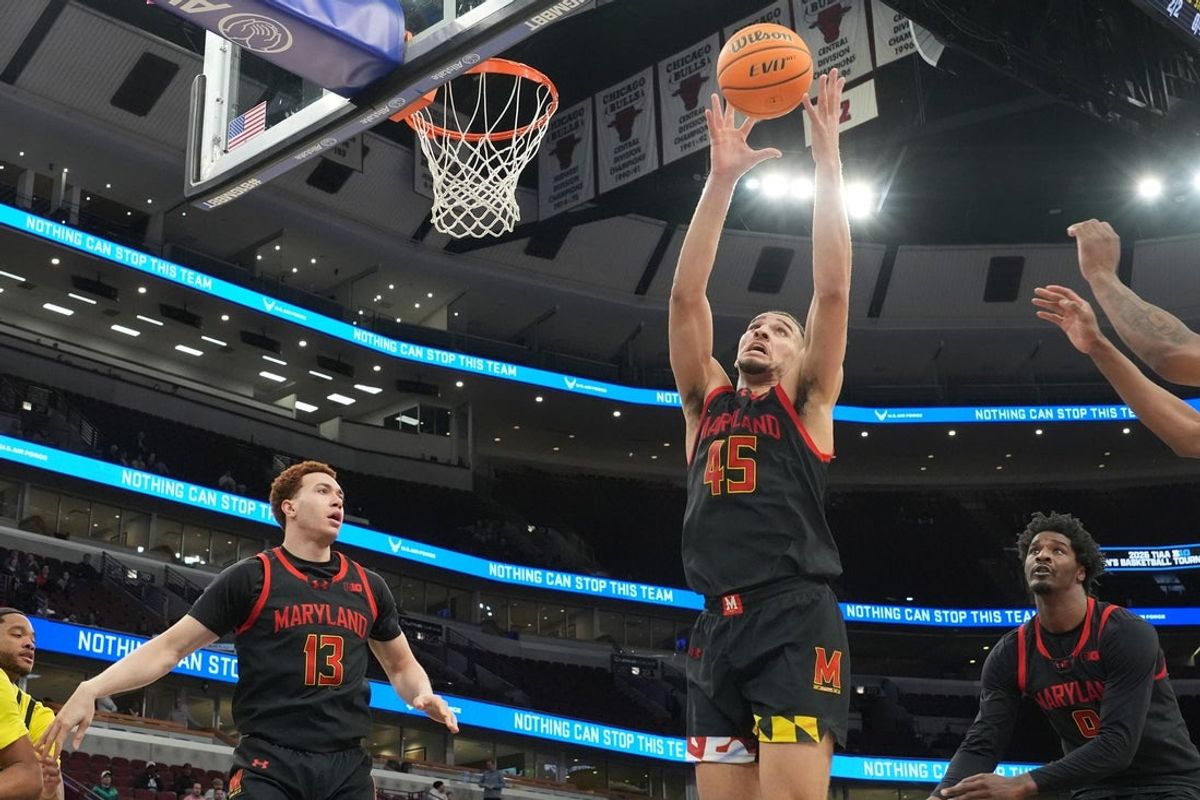 Mar 10, 2026; Chicago, IL, USA; Maryland Terrapins center Collin Metcalf (45) rebounds against the Oregon Ducks during the first half at United Center. Mandatory Credit: David Banks-Imagn Images