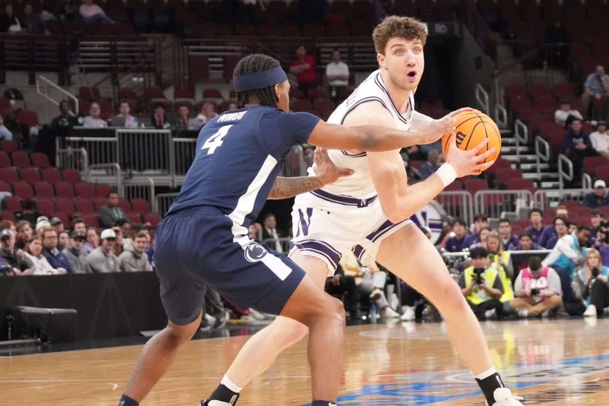 Mar 10, 2026; Chicago, IL, USA; Penn State Nittany Lions guard Kayden Mingo (4) defends Northwestern Wildcats forward Nick Martinelli (2) during the first half at United Center. Mandatory Credit: David Banks-Imagn Images