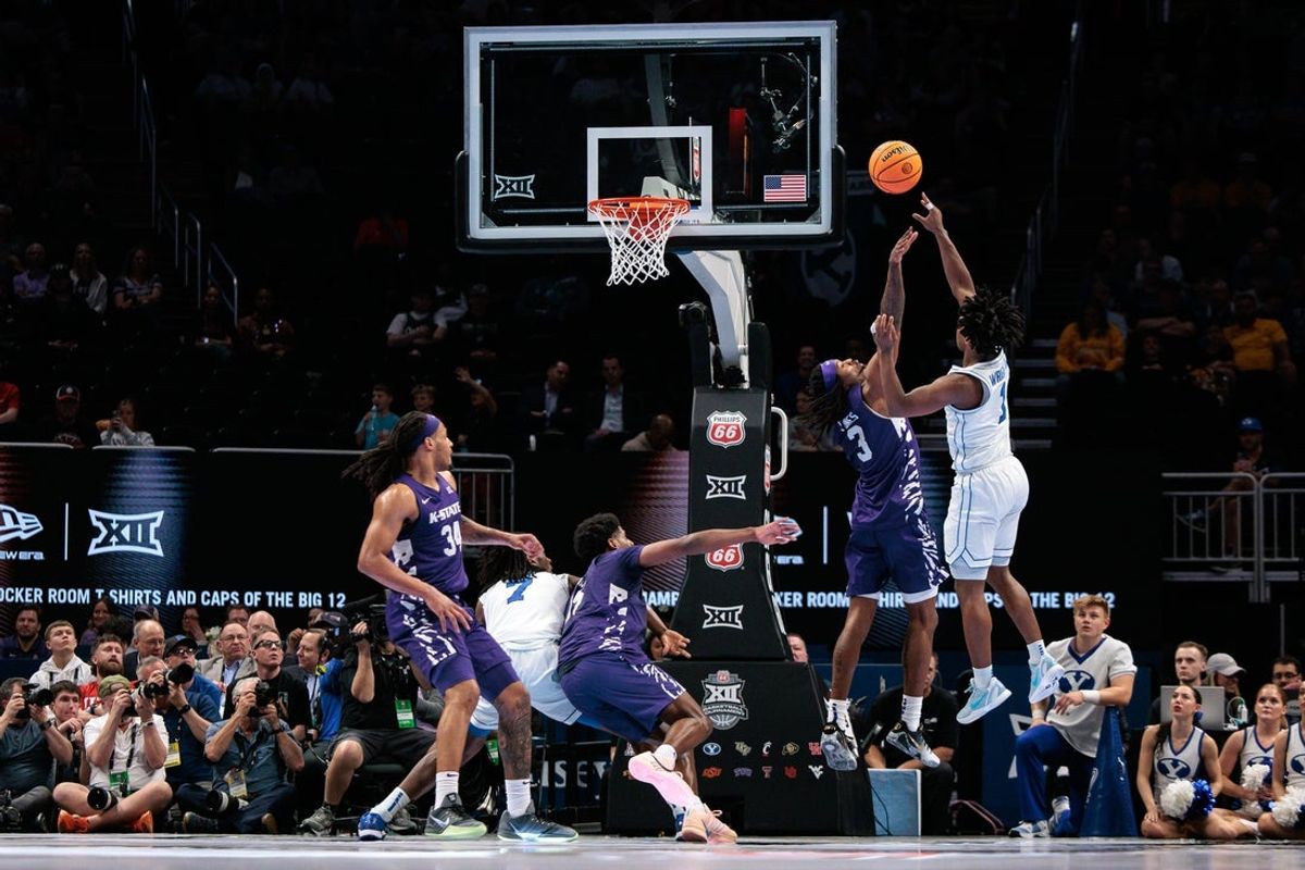 Mar 10, 2026; Kansas City, MO, USA; BYU Cougars forward AJ Dybantsa (3) shoots the ball over Kansas State Wildcats guard C.J. Jones (3) during the second half at T-Mobile Center. Mandatory Credit: William Purnell-Imagn Images