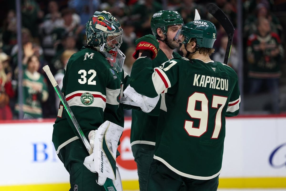 Mar 10, 2026; Saint Paul, Minnesota, USA; Minnesota Wild goaltender Filip Gustavsson (32) and left wing Kirill Kaprizov (97) celebrate their teams win against the Utah Mammoth during the third period at Grand Casino Arena. Mandatory Credit: Matt Krohn-Imagn Images