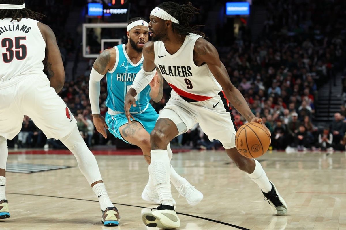 Mar 10, 2026; Portland, Oregon, USA;  Portland Trail Blazers forward Jerami Grant (9) drives to the basket against Charlotte Hornets forward Miles Bridges (0) during the second half at Moda Center. Mandatory Credit: Jaime Valdez-Imagn Images
