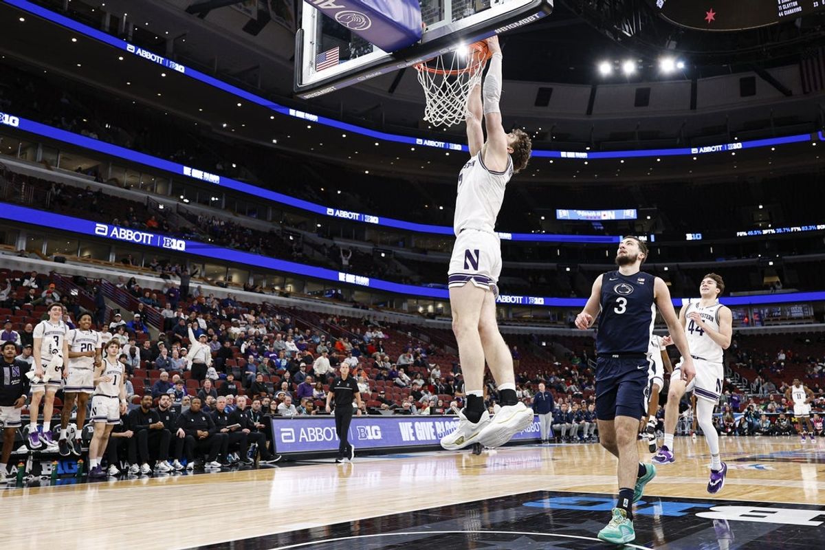 Mar 10, 2026; Chicago, IL, USA; Northwestern Wildcats forward Nick Martinelli (2) scores against the Penn State Nittany Lions during the second half at United Center. Mandatory Credit: Kamil Krzaczynski-Imagn Images