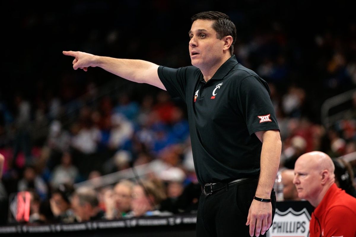 Mar 11, 2026; Kansas City, MO, USA; Cincinnati Bearcats coach Wes Miller directs game play during the first half against the UCF Knights at T-Mobile Center. Mandatory Credit: William Purnell-Imagn Images
