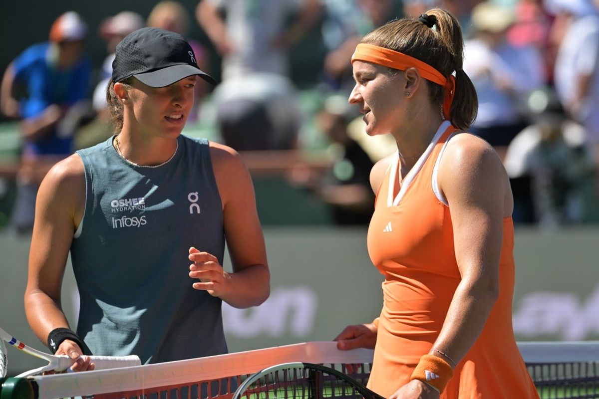 Mar 11, 2026; Indian Wells, CA, USA;  Iga Swiatek (POL) shakes hands with Karolina Muchova (CZE) after their fourth round in the BNP Paribas Open at the Indian Wells Tennis Garden. Mandatory Credit: Jayne Kamin-Oncea-Imagn Images