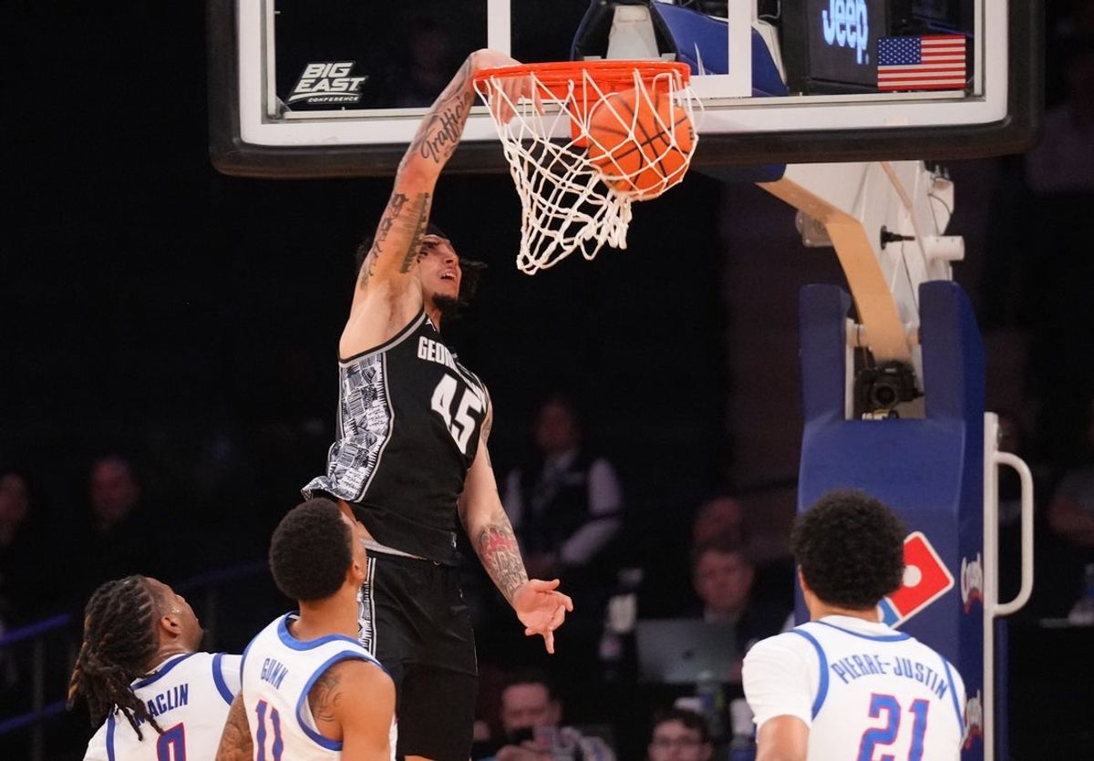 Mar 11, 2026; New York, NY, USA;  Georgetown Hoyas guard Kayvaun Mulready (45) dunks past the DePaul Blue Demons defense during the first half at Madison Square Garden. Mandatory Credit: Robert Deutsch-Imagn Images