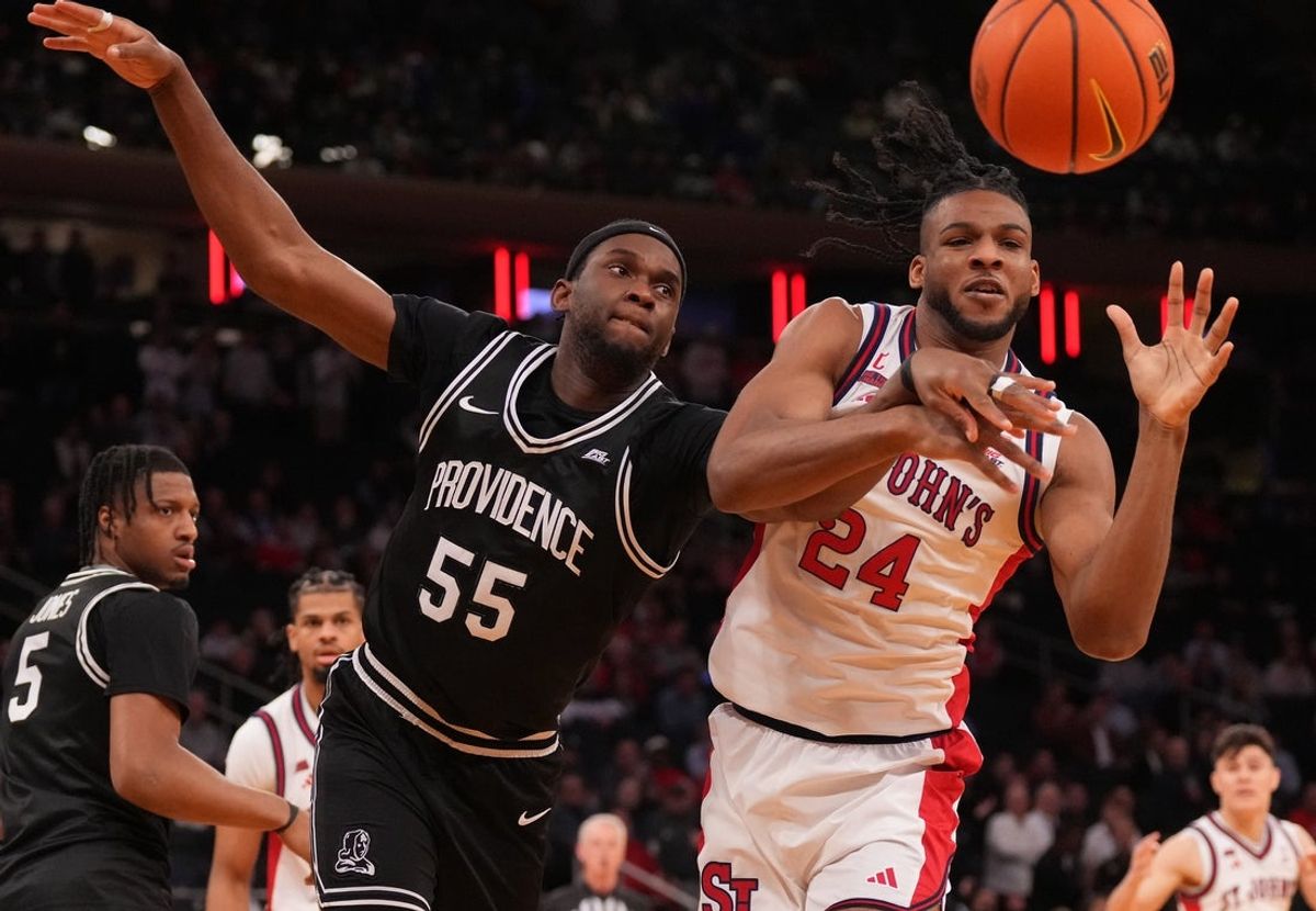 Mar 12, 2026; New York, NY, USA;  Providence Friars forward Oswin Erhunmwunse (55) defends against St. John's Red Storm forward Zuby Ejiofor (24) during the first half at Madison Square Garden. Mandatory Credit: Robert Deutsch-Imagn Images