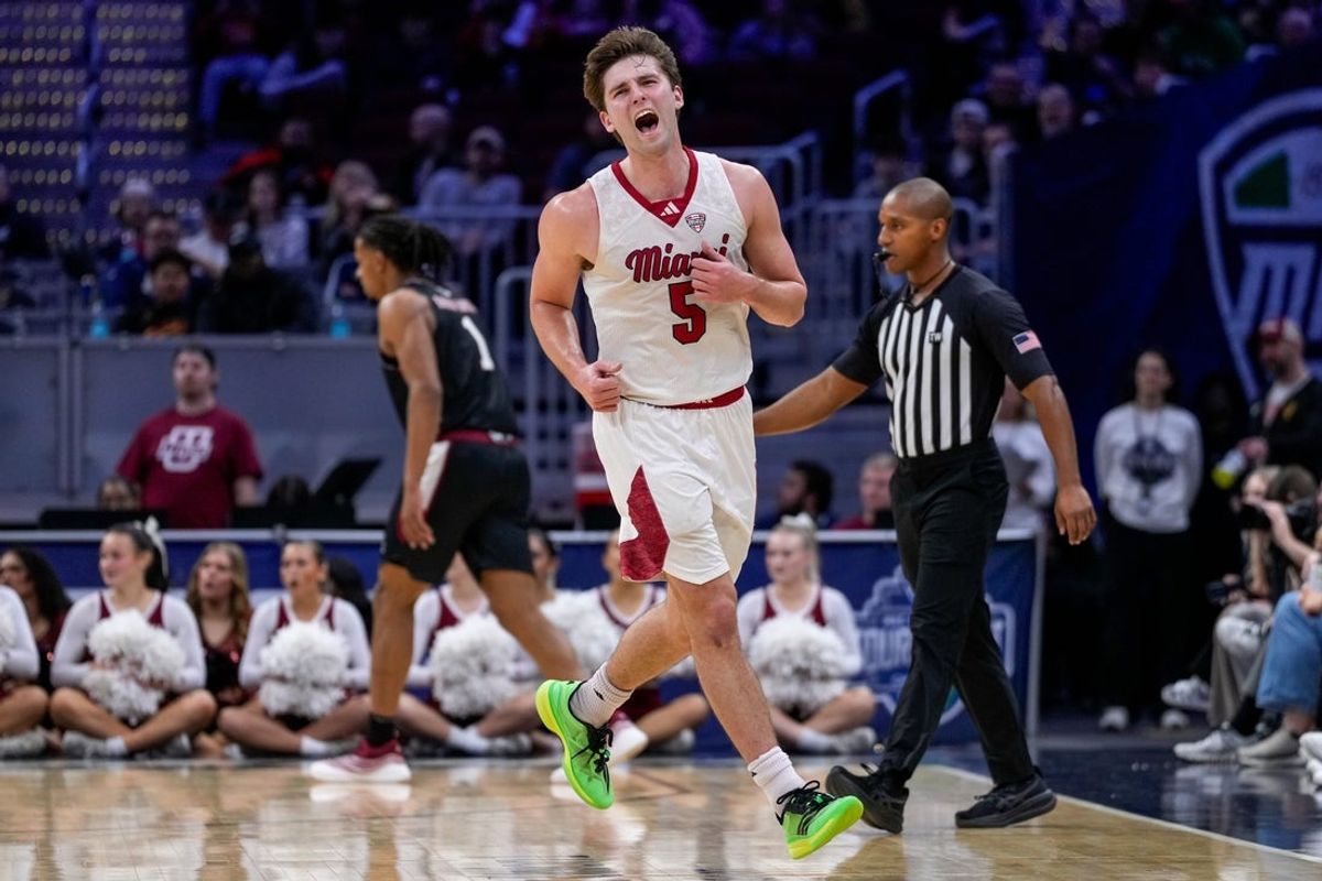 Miami RedHawks guard Peter Suder (5) reacts to a turnover in the second half of Mid-American Conference Tournament first round game between the Miami RedHawks and the UMass Minutemen at Rocket Arena in Cleveland on Thursday, March 12, 2026. Top-seeded Miami was eliminated from the tournament with an 87-82 loss to the Minutemen.