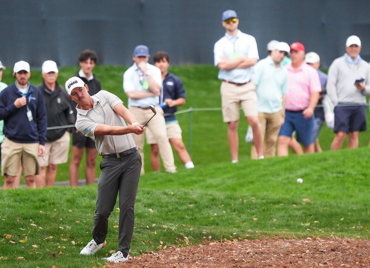 Maverick McNealy hits out of the rough on 18 during the first round of The Players Championship golf tournament at TPC Sawgrass, March 12, 2026 in Ponte Vedra Beach, Fla. March 12, 2026. [Doug Engle/Florida Times-Union]