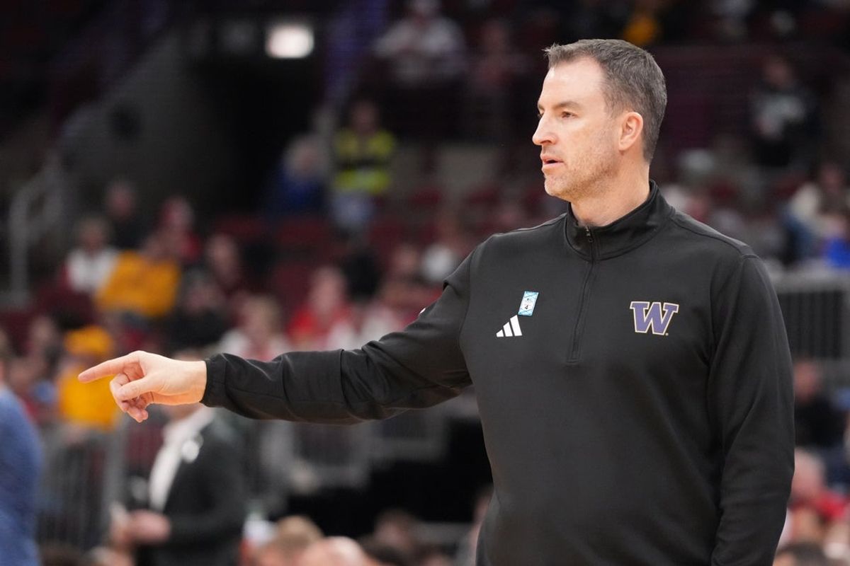 Mar 12, 2026; Chicago, IL, USA; Washington Huskies head coach Danny Sprinkle gestures to his team against the Wisconsin Badgers during the second half at United Center. Mandatory Credit: David Banks-Imagn Images