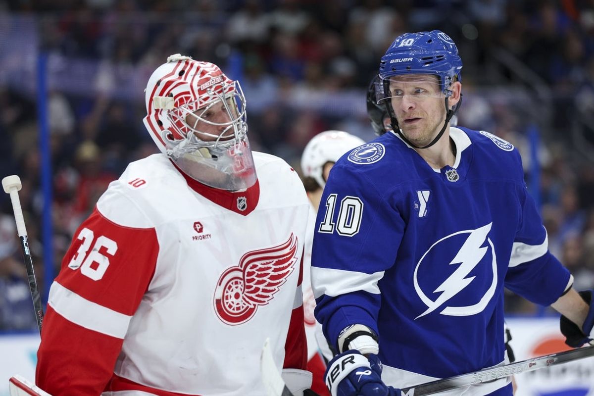 Mar 12, 2026; Tampa, Florida, USA; Tampa Bay Lightning right wing Corey Perry (10) looks to Detroit Red Wings goaltender John Gibson (36) in the first period at Benchmark International Arena. Mandatory Credit: Nathan Ray Seebeck-Imagn Images