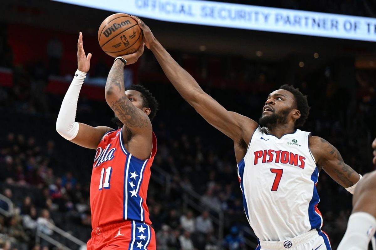 Mar 12, 2026; Detroit, Michigan, USA; Detroit Pistons forward Paul Reed (7) blocks a shot from Philadelphia 76ers forward Justin Edwards (11) in the second half at Little Caesars Arena. Mandatory Credit: Lon Horwedel-Imagn Images