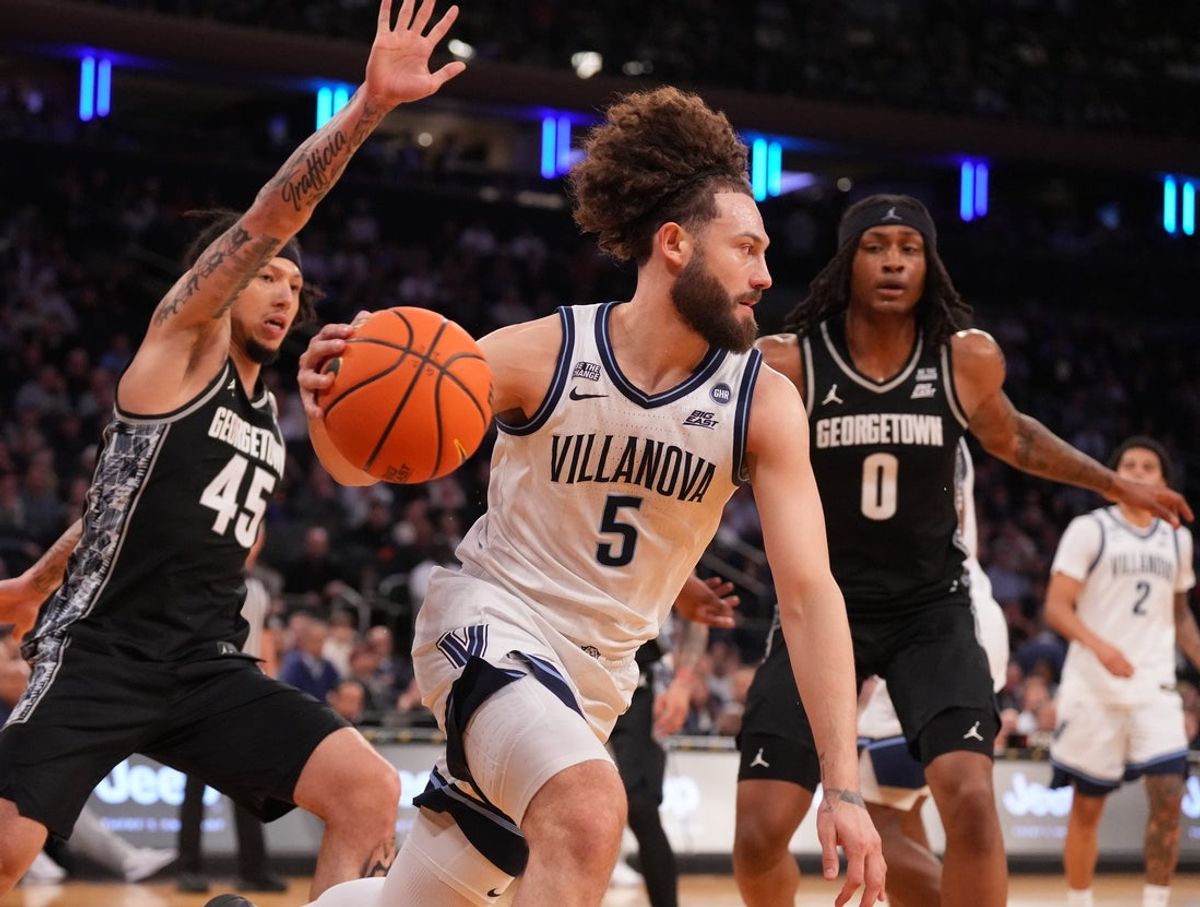 Mar 12, 2026; New York, NY, USA;  Villanova Wildcats guard Devin Askew (5) moves the ball against the Georgetown Hoyas during the first half at Madison Square Garden. Mandatory Credit: Robert Deutsch-Imagn Images