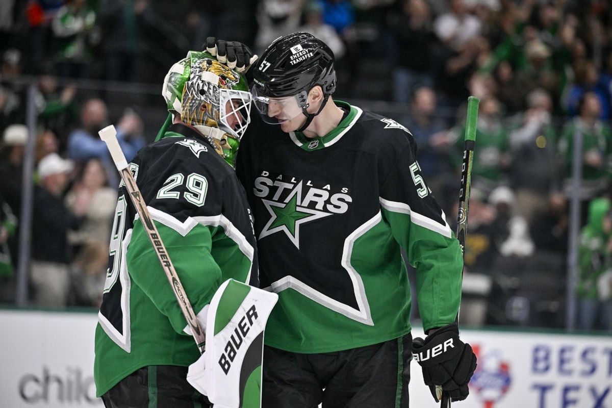 Mar 12, 2026; Dallas, Texas, USA; Dallas Stars goaltender Jake Oettinger (29) and defenseman Tyler Myers (57) celebrate the win over the Edmonton Oilers at the American Airlines Center. Mandatory Credit: Jerome Miron-Imagn Images