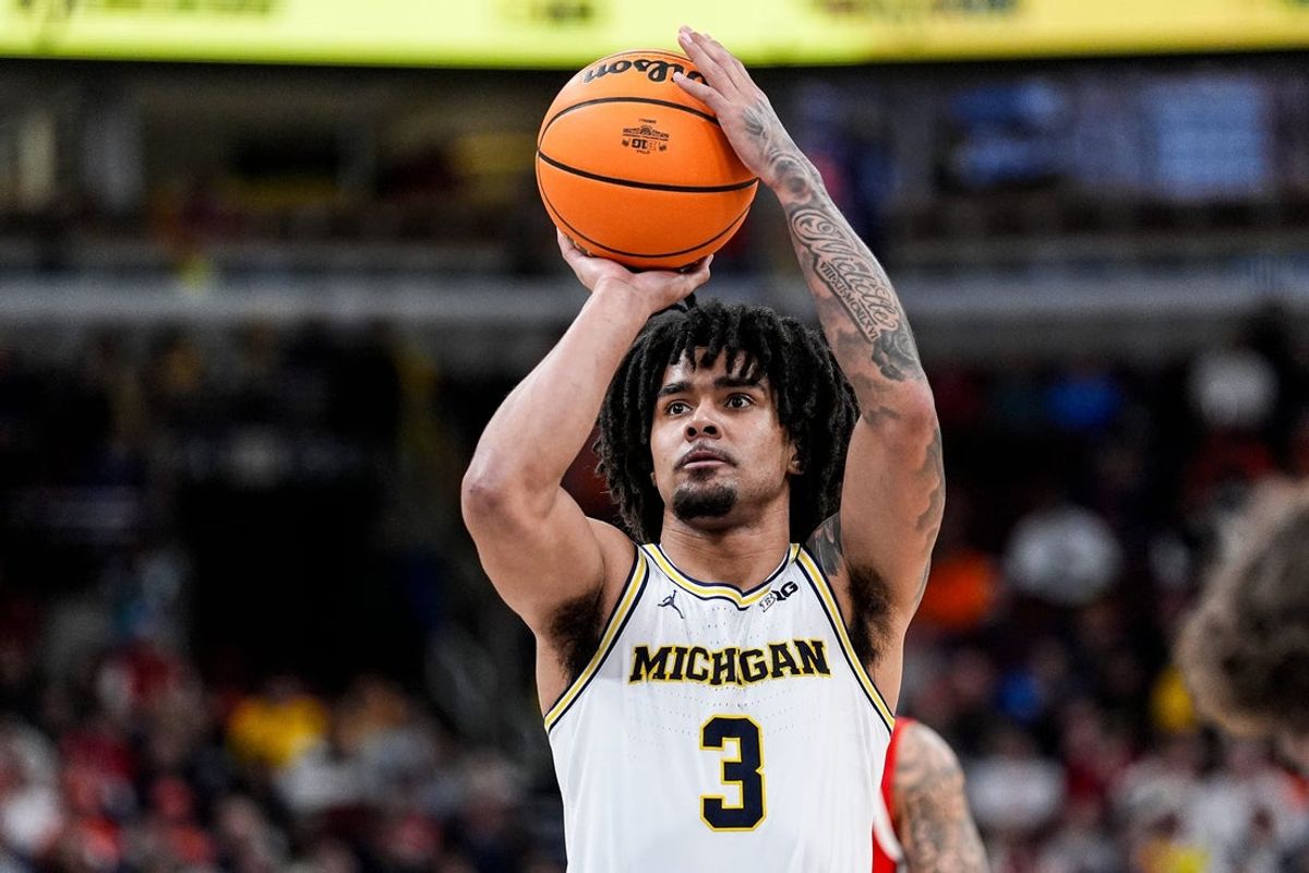 Michigan guard Elliot Cadeau (3) attempts a free throw against Ohio State during the second half of Big Ten tournament quarterfinal at United Center in Chicago on Friday, March 13, 2026.