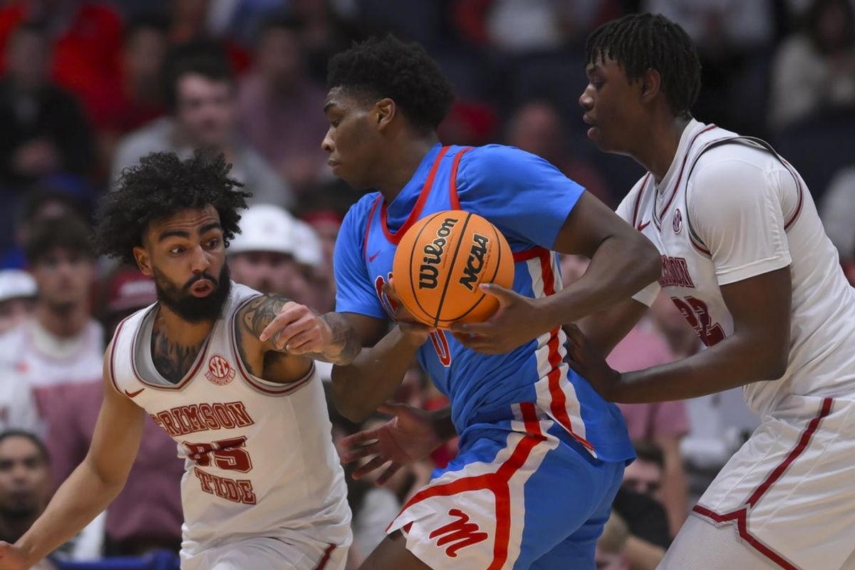 Mar 13, 2026; Nashville, TN, USA;  Alabama Crimson Tide guard Houston Mallette (95) and forward Aiden Sherrell (22) double team against the Mississippi Rebels during the first half at Bridgestone Arena. Mandatory Credit: Steve Roberts-Imagn Images