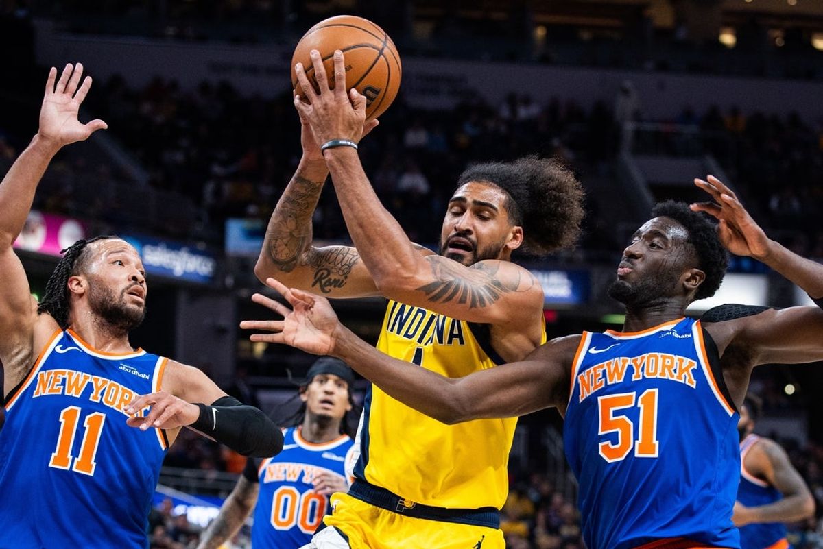 Mar 13, 2026; Indianapolis, Indiana, USA;  Indiana Pacers forward Obi Toppin (1) shoots the ball while New York Knicks forward Mohamed Diawara (51) defends in the first half at Gainbridge Fieldhouse. Mandatory Credit: Trevor Ruszkowski-Imagn Images