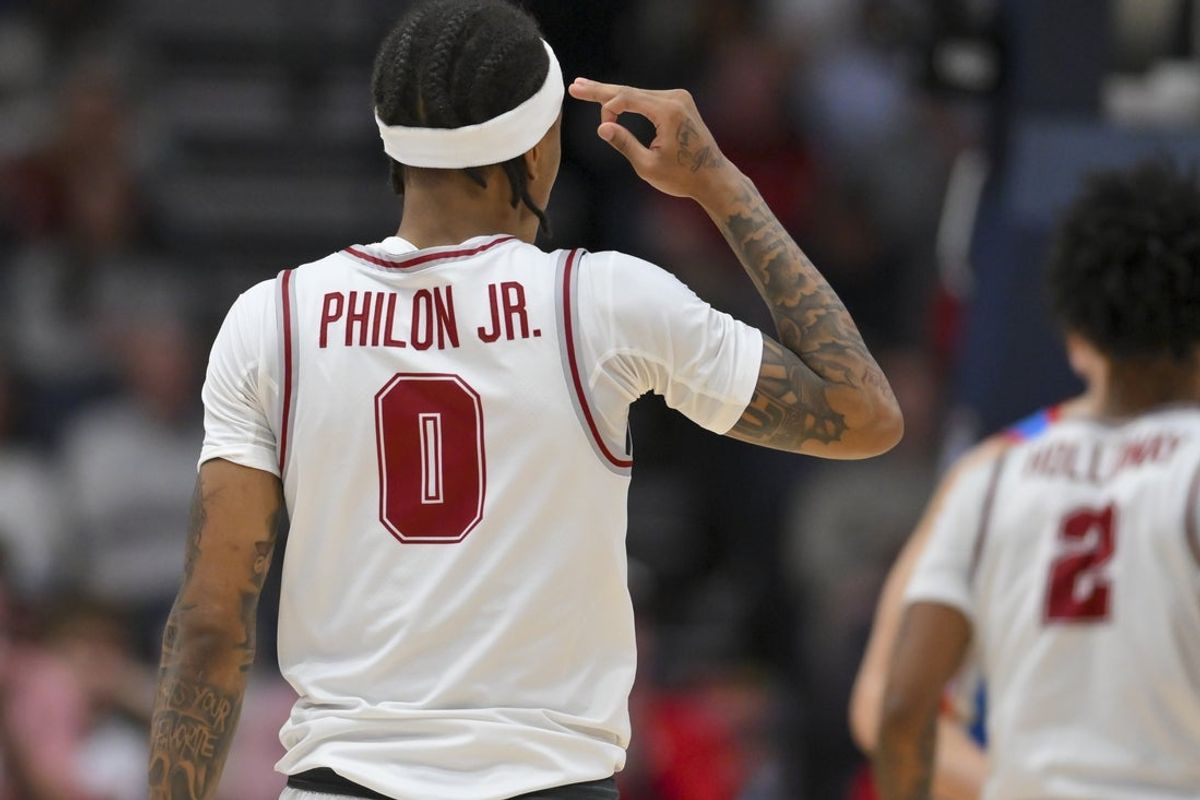 Mar 13, 2026; Nashville, TN, USA;  Alabama Crimson Tide guard Labaron Philon (0) reacts after a made three point basket against the Mississippi Rebels during the second half at Bridgestone Arena. Mandatory Credit: Steve Roberts-Imagn Images