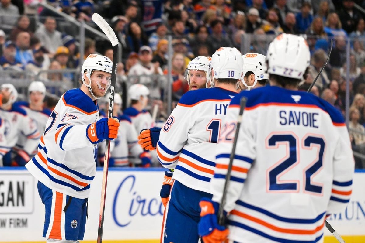 Mar 13, 2026; St. Louis, Missouri, USA; Edmonton Oilers center Connor McDavid (97) is congratulated by teammates after scoring against the St. Louis Blues during the third period at Enterprise Center. Mandatory Credit: Jeff Curry-Imagn Images