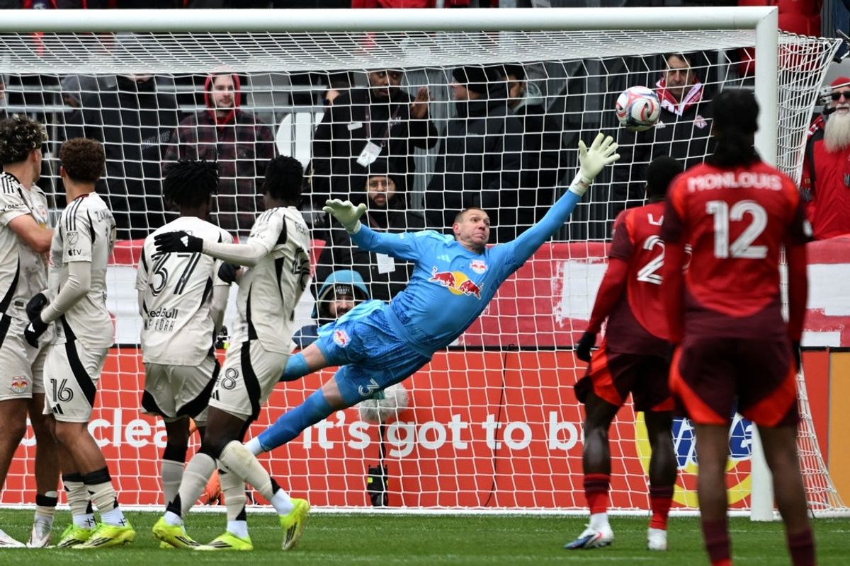 Mar 14, 2026; Toronto, Ontario, CAN;  New York Red Bulls goalkeeper Ethan Horvath (34) makes a save on a free kick against Toronto FC in the first half at BMO Field. Mandatory Credit: Dan Hamilton-Imagn Images