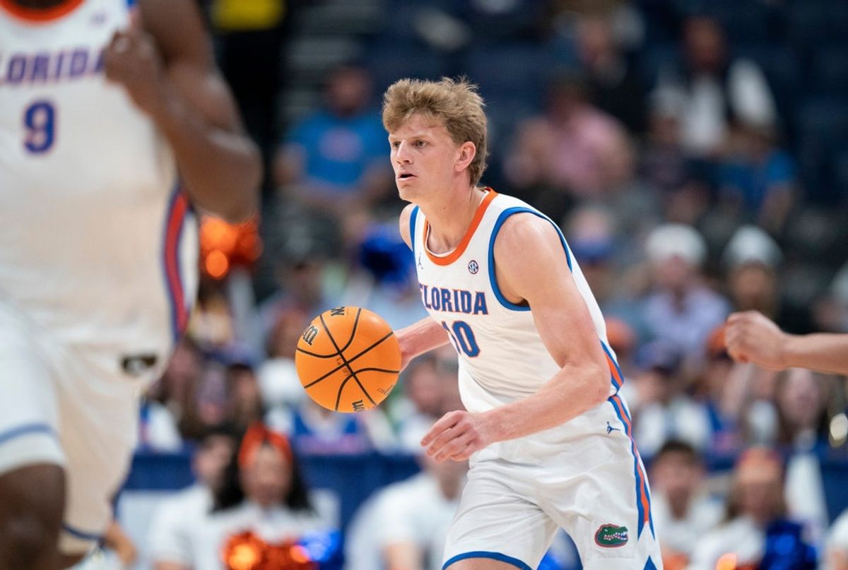 Florida forward Thomas Haugh (10) handles the ball against Vanderbilt during their semifinal game of the 2026 SEC Men’s Basketball Tournament at Bridgestone Arena in Nashville, Tenn., Saturday, March 14, 2026.