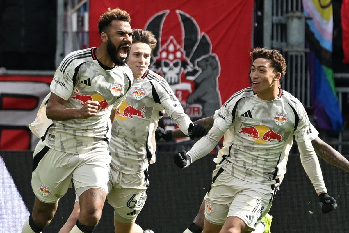 Mar 14, 2026; Toronto, Ontario, CAN;  New York Red Bulls forward Eric Maxim Choupo-Moting (13) celebrates with team mates after scoring a goal against Toronto FC in the second half at BMO Field. Mandatory Credit: Dan Hamilton-Imagn Images