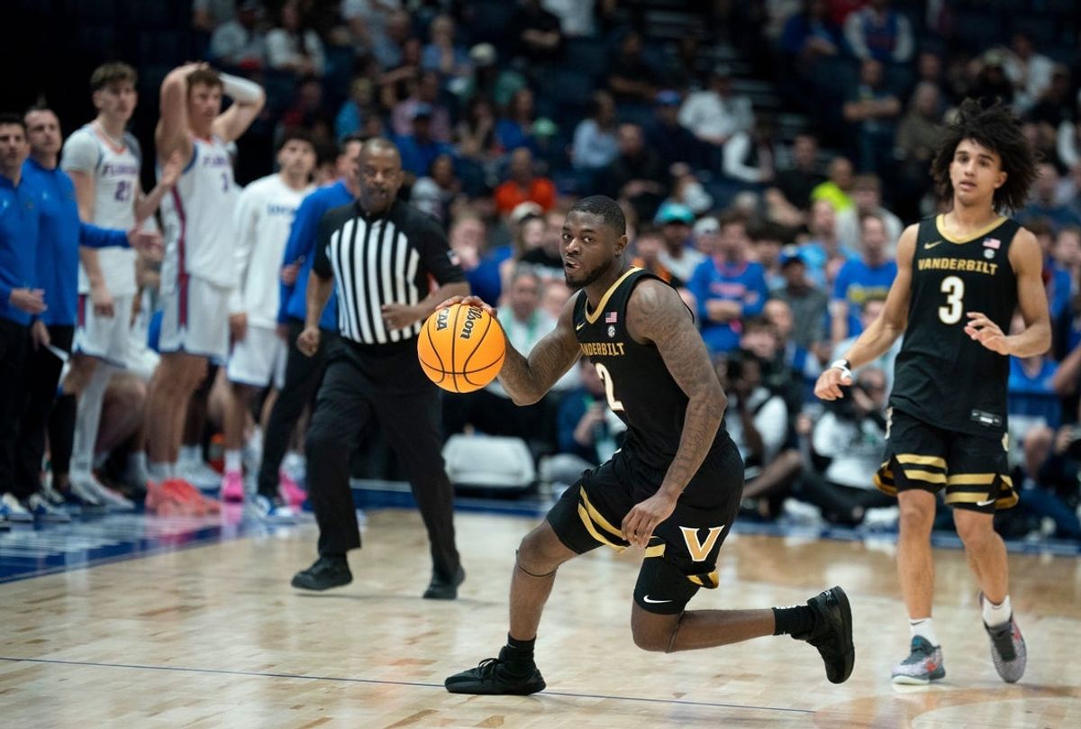 Vanderbilt guard Duke Miles (2) starts a fast break against Florida during their semifinal game of the 2026 SEC Men’s Basketball Tournament at Bridgestone Arena in Nashville, Tenn., Saturday, March 14, 2026.
