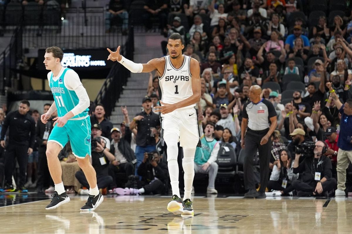 Mar 14, 2026; San Antonio, Texas, USA;  San Antonio Spurs forward Victor Wembanyama (1) celebrates a shot in the first half against the Charlotte Hornets at Frost Bank Center. Mandatory Credit: Daniel Dunn-Imagn Images