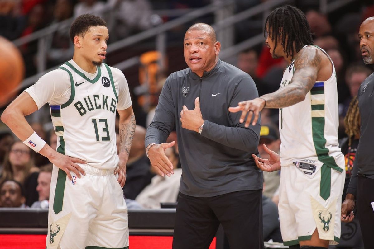 Mar 14, 2026; Atlanta, Georgia, USA; Milwaukee Bucks head coach Doc Rivers talks to guard Ryan Rollins (13) and guard Kevin Porter Jr. (7) against the Atlanta Hawks in the second quarter at State Farm Arena. Mandatory Credit: Brett Davis-Imagn Images