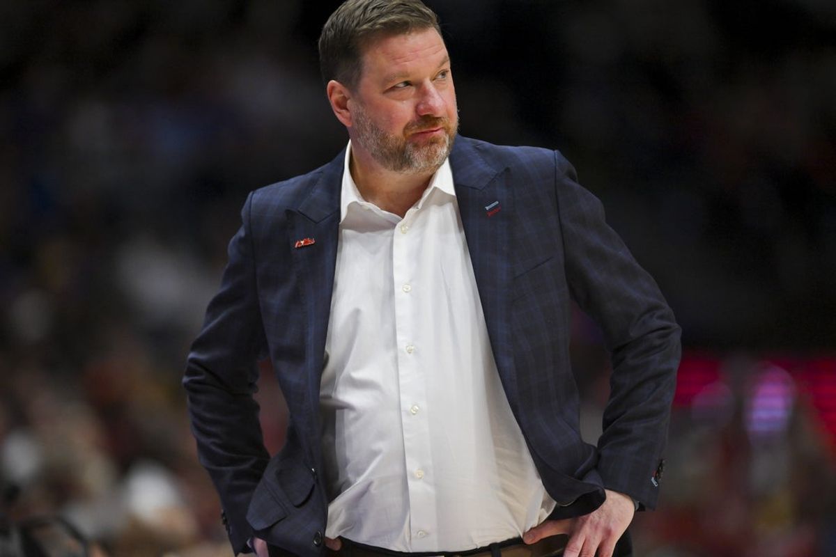 Mar 14, 2026; Nashville, TN, USA;  Mississippi Rebels head coach Chris Beard watches against the Arkansas Razorbacks during the first half at Bridgestone Arena. Mandatory Credit: Steve Roberts-Imagn Images