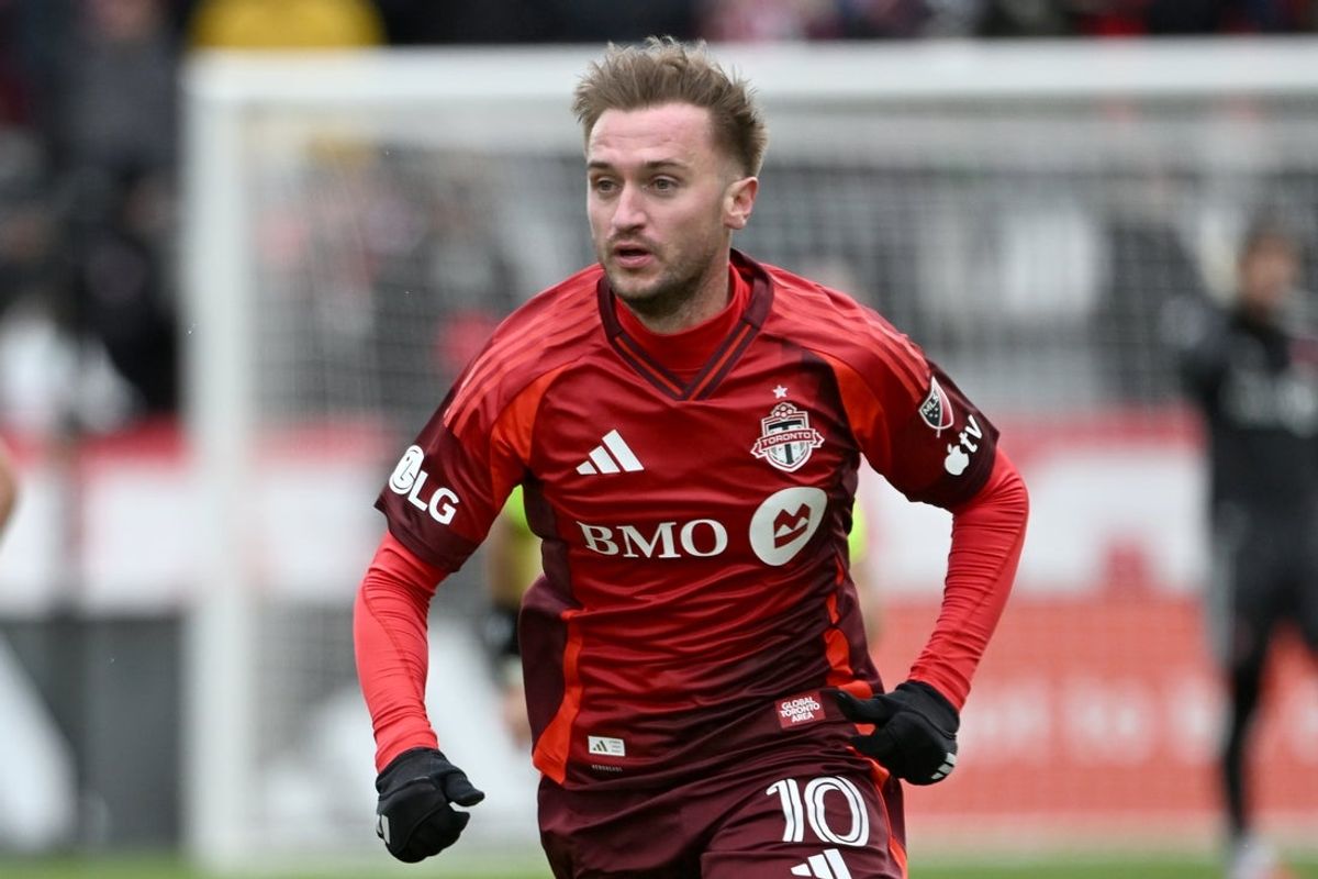 Mar 14, 2026; Toronto, Ontario, CAN; Toronto FC midfielder Djordje Mihailovic (10) pursues the play against the New York Red Bulls in the second half at BMO Field. Mandatory Credit: Dan Hamilton-Imagn Images