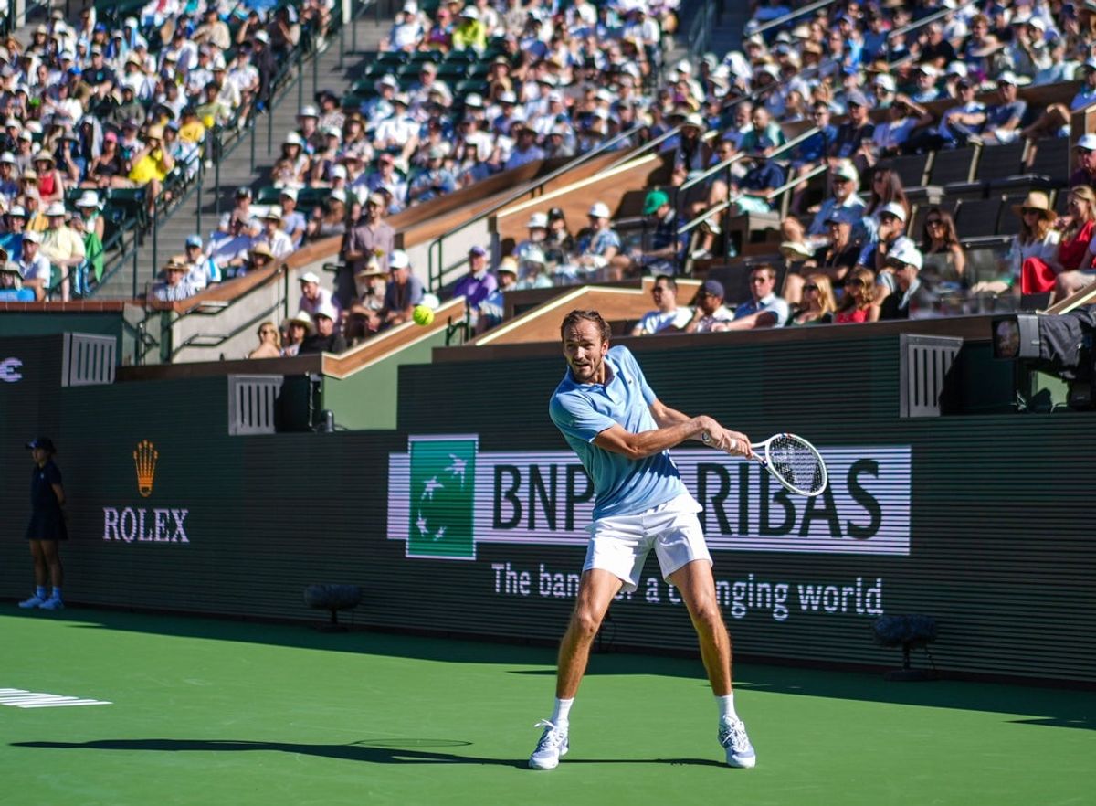 Daniil Medvedev hits a return against Carlos Alcaraz during the BNP Paribas Open men’s semifinal match in Indian Wells, Calif., March 14, 2026.