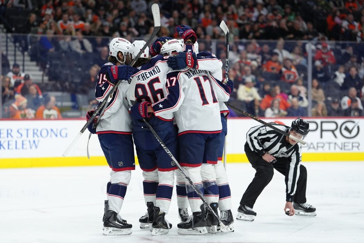Mar 14, 2026; Philadelphia, Pennsylvania, USA; Columbus Blue Jackets right wing Kirill Marchenko (86) celebrates with teammates after scoring a goal against the Philadelphia Flyers in the first period at Xfinity Mobile Arena. Mandatory Credit: Kyle Ross-Imagn Images