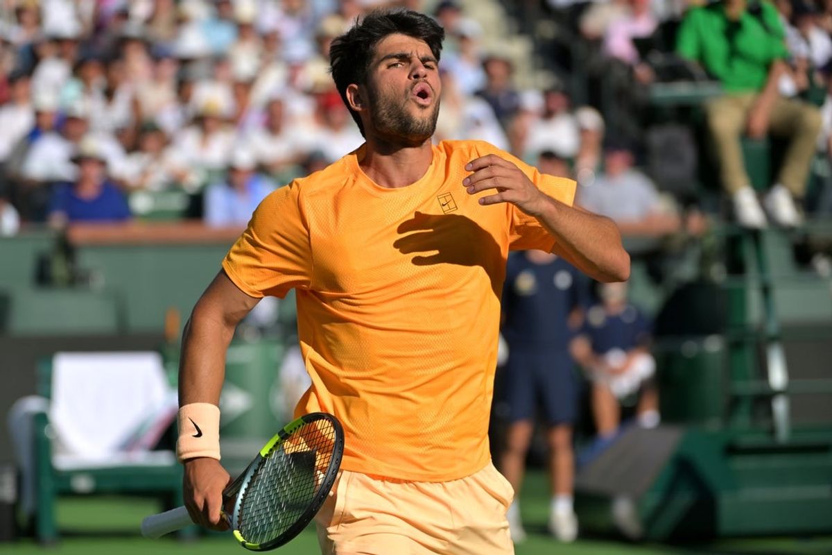 Mar 14, 2026; Indian Wells, CA, USA; Carlos Alcaraz (ESP) reacts as a ball gets past him at the net during his semifinal match against Daniil Medvedev (RUS) in the BNP Paribas Open at the Indian Wells Tennis Garden. Mandatory Credit: Jayne Kamin-Oncea-Imagn Images
