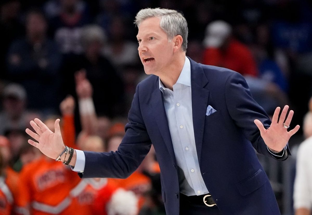 Mar 14, 2026; Charlotte, NC, USA; Virginia Cavaliers head coach Ryan Odom instructs his team against the Duke Blue Devils during the men's ACC Conference Tournament Championship at Spectrum Center. Mandatory Credit: Bob Donnan-Imagn Images
