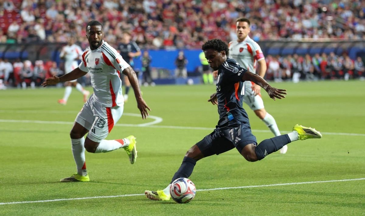 Mar 14, 2026; Frisco, Texas, USA;  San Diego FC midfielder Alex Mighten (77) kicks the ball as FC Dallas defender Shaq Moore (18) defends during the first half at Toyota Stadium. Mandatory Credit: Kevin Jairaj-Imagn Images