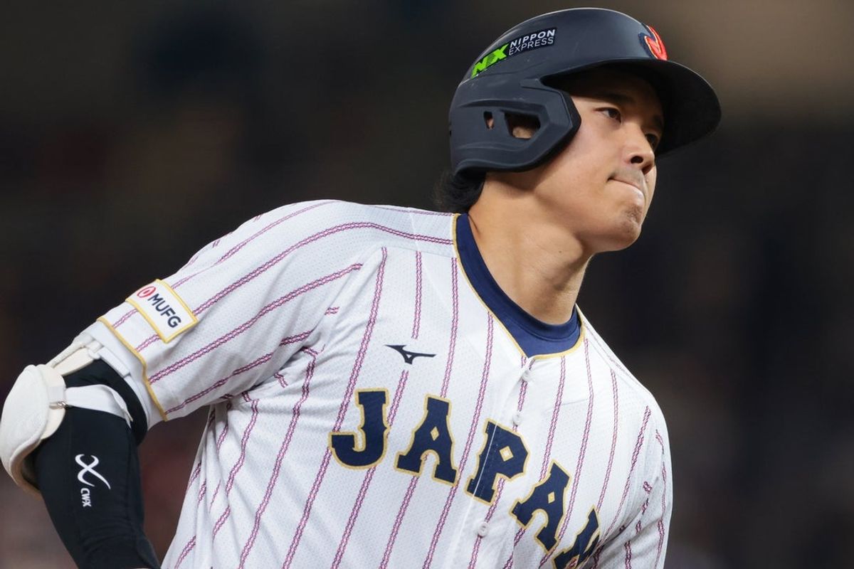 Mar 14, 2026; Miami, FL, United States; Japan designated hitter Shohei Ohtani (16) rounds the bases after hitting a home run against Venezuela in the first inning during a quarterfinal game of the 2026 World Baseball Classic at loanDepot Park. Mandatory Credit: Sam Navarro-Imagn Images