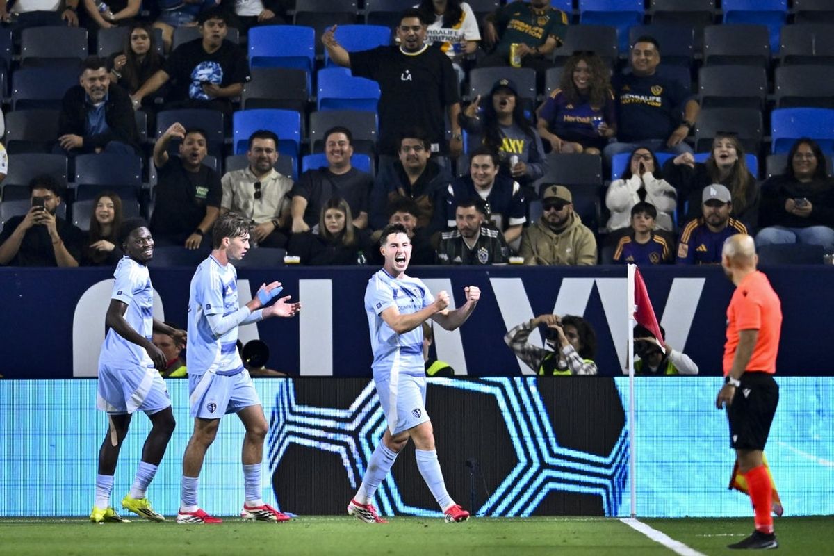 Mar 14, 2026; Carson, California, USA; Sporting Kansas City goalkeeper Lasse Berg Johnsen (4) celebrates his goal during the second half against the LA Galaxy at Dignity Health Sports Park. Mandatory Credit: Kelvin Kuo-Imagn Images