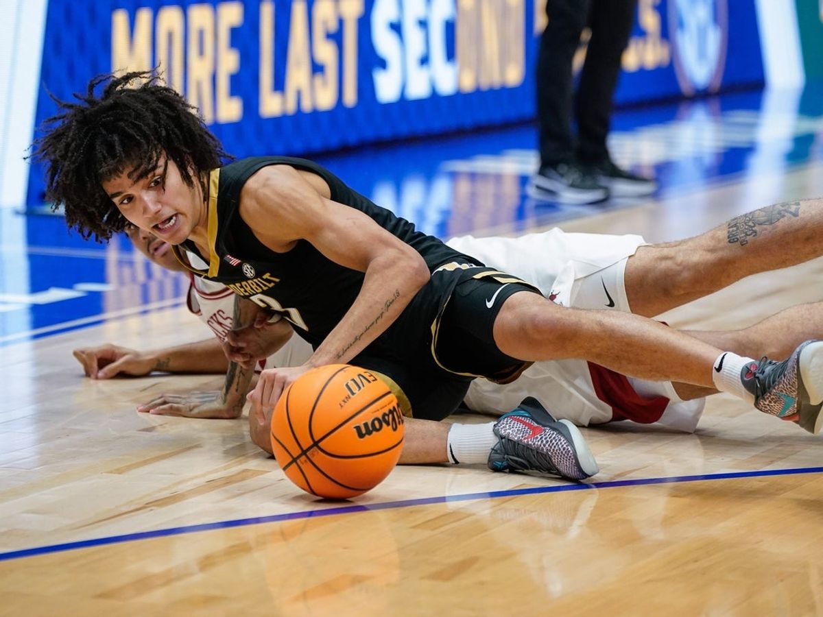 Vanderbilt guard Tyler Tanner (3) battles for the ball during the first half of the SEC tournament championship game against Arkansas at Bridgestone Arena in Nashville, Tenn., Sunday, March 15, 2026.