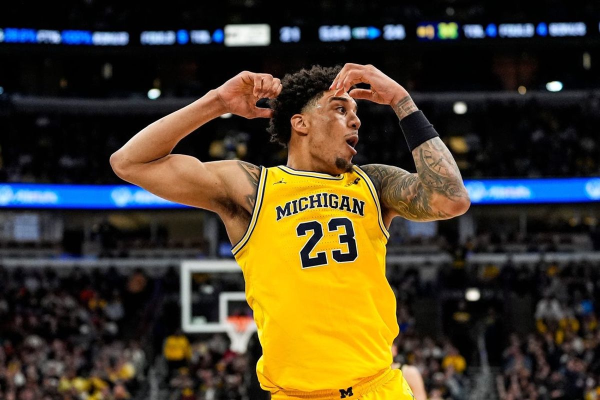 Michigan forward Yaxel Lendeborg (23) reacts being called a personal foul against him during the first half of Big Ten Tournament final against Purdue at United Center in Chicago on Sunday, March 15, 2026.