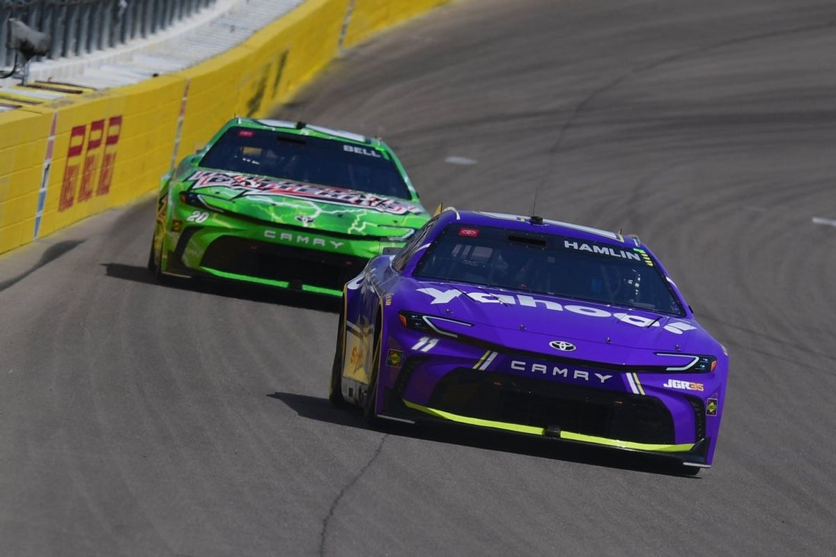 Mar 15, 2026; Las Vegas, Nevada, USA; Joe Gibbs Racing driver Denny Hamlin (11) leads Joe Gibbs Racing driver Christopher Bell (20) during the Pennzoil 400 at Las Vegas Motor Speedway. Mandatory Credit: Gary A. Vasquez-Imagn Images