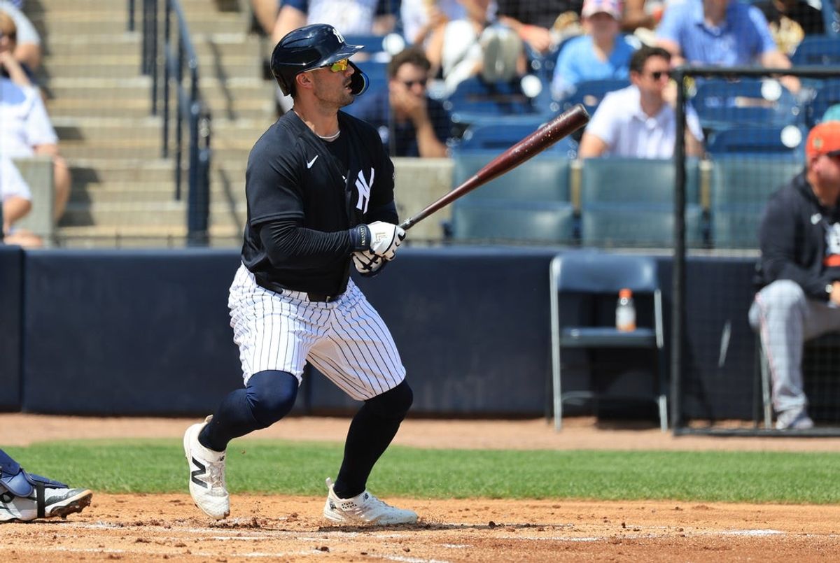 Mar 15, 2026; Tampa, Florida, USA;  New York Yankees outfielder Randal Grichuk (34) singles during the first inning against the Detroit Tigers at George M. Steinbrenner Field. Mandatory Credit: Kim Klement Neitzel-Imagn Images
