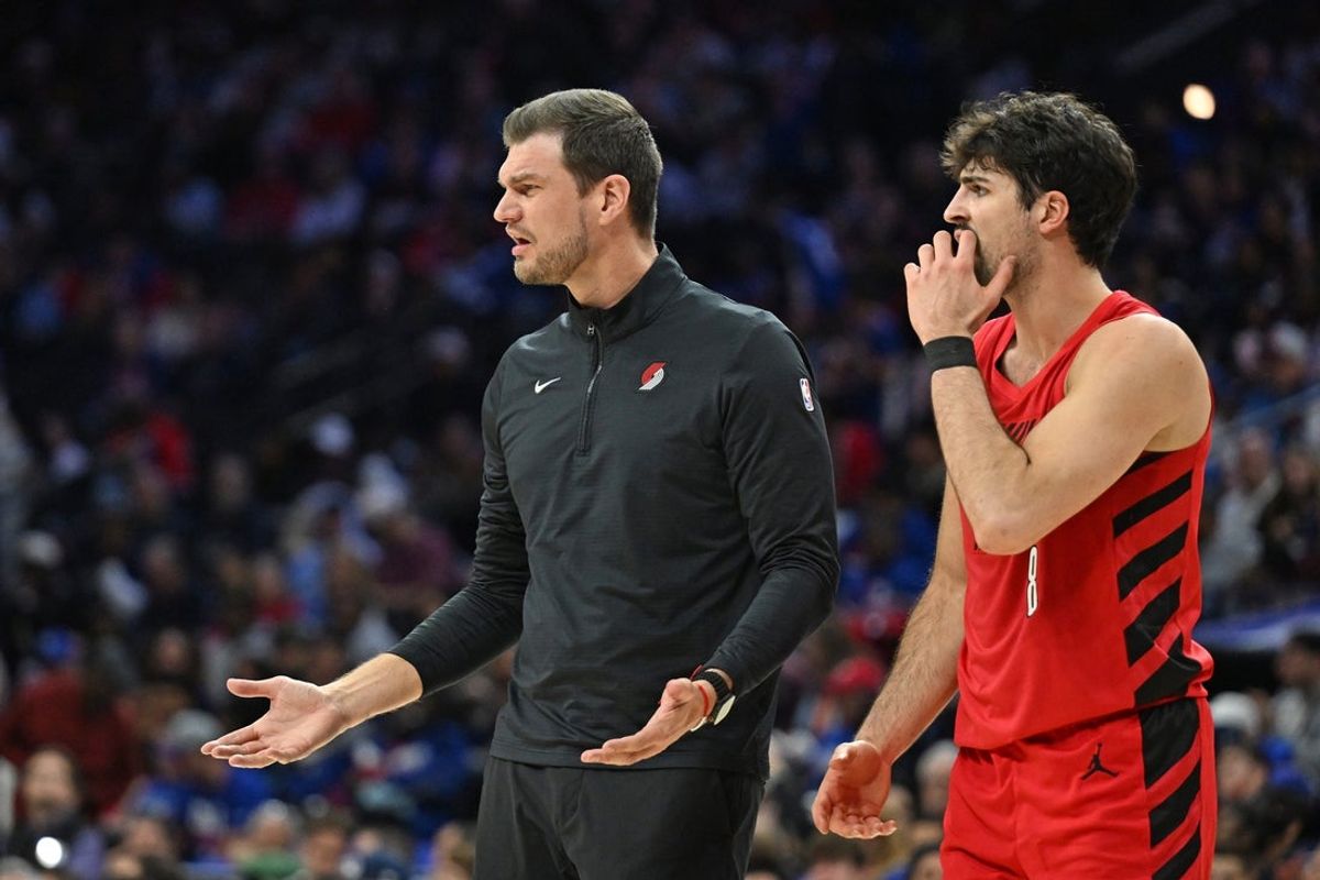 Mar 15, 2026; Philadelphia, Pennsylvania, USA; Portland Trail Blazers head Tiago Splitter and forward Deni Avdija (8) question the referees against the Philadelphia 76ers during the second half at Xfinity Mobile Arena. Mandatory Credit: Eric Hartline-Imagn Images