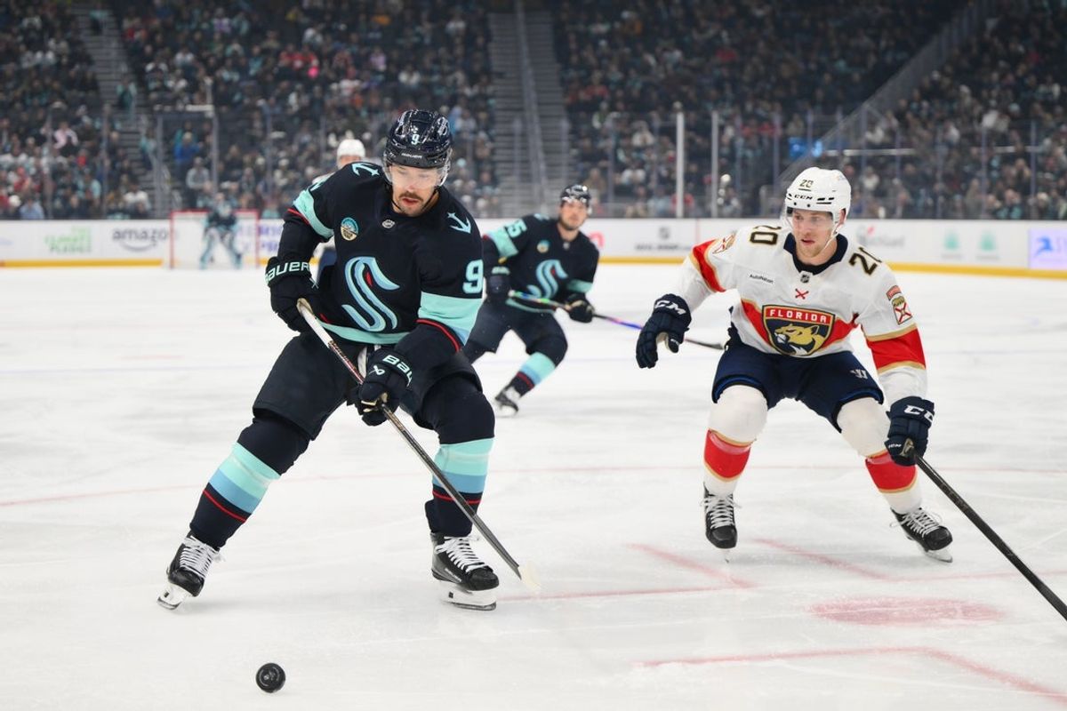 Mar 15, 2026; Seattle, Washington, USA; Seattle Kraken center Chandler Stephenson (9)  plays the puck during the first period against the Florida Panthers at Climate Pledge Arena. Mandatory Credit: Steven Bisig-Imagn Images