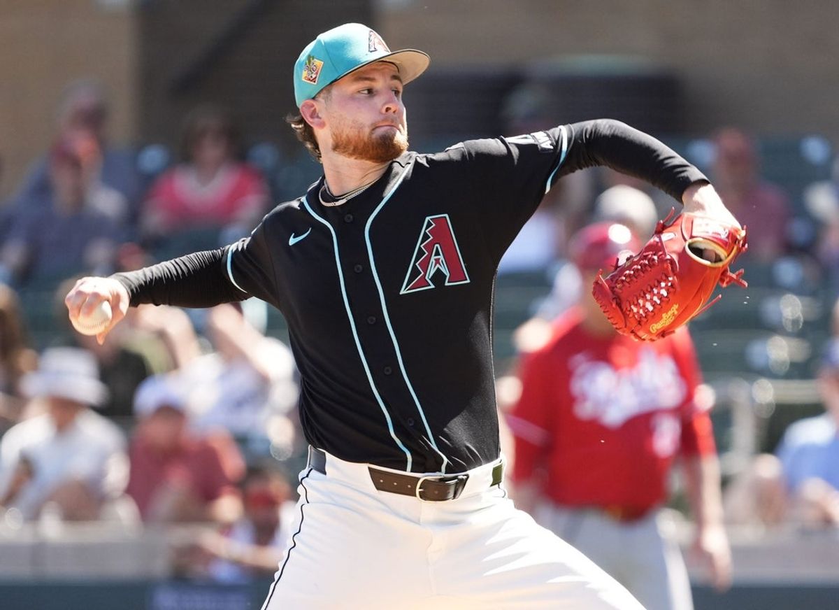 Arizona Diamondbacks pitcher Ryne Nelson (19) throws to the Cincinnati Reds in the second inning during a spring training game on March 16, 2026, at Salt River Fields in Scottsdale.