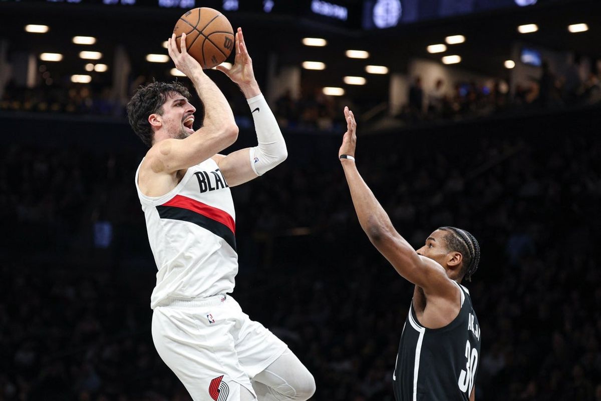 Mar 16, 2026; Brooklyn, New York, USA; Portland Trail Blazers forward Deni Avdija (8) shoots the ball as Brooklyn Nets guard Ochai Agbaji (30) defends during the first half at Barclays Center. Mandatory Credit: Vincent Carchietta-Imagn Images
