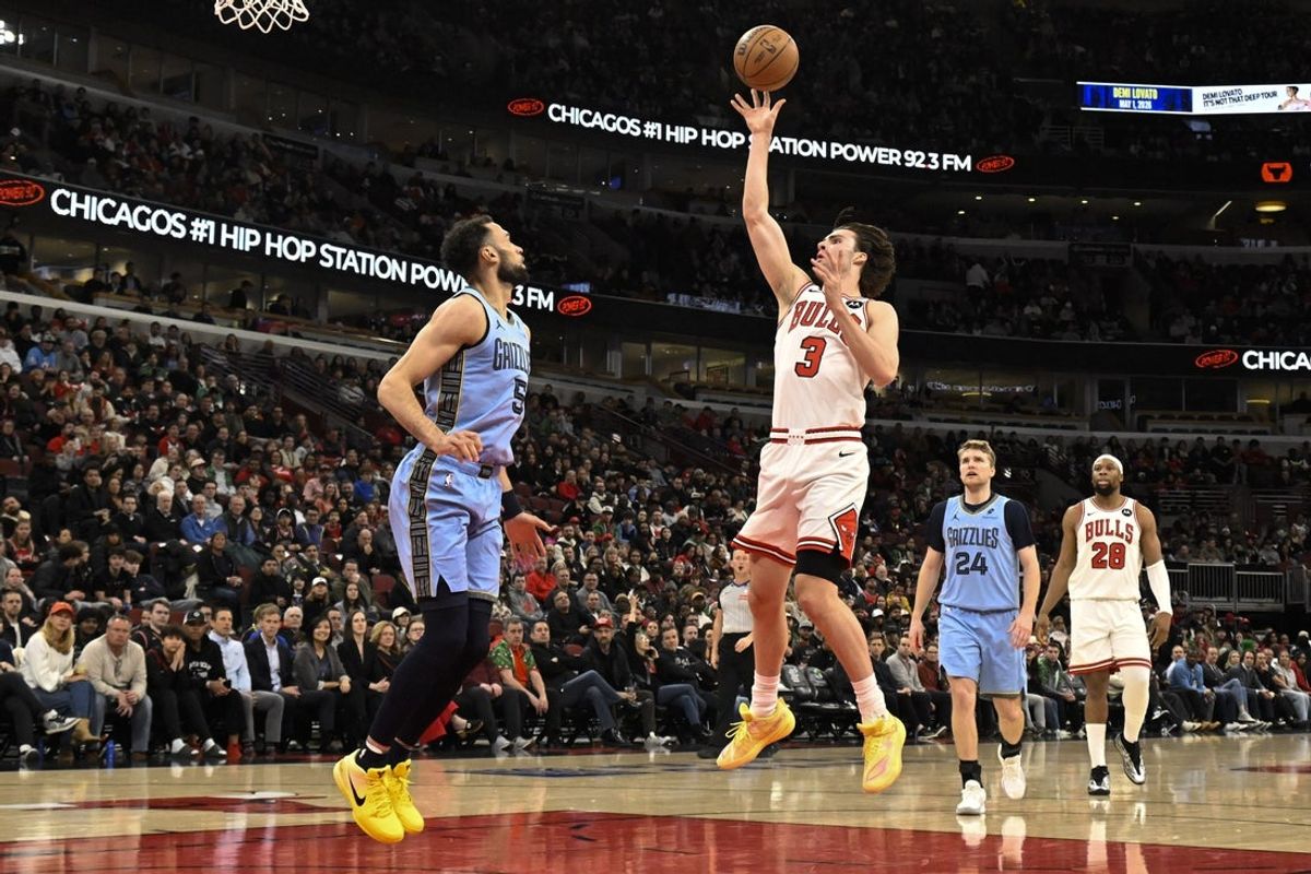 Mar 16, 2026; Chicago, Illinois, USA; Chicago Bulls guard Josh Giddey (3) shoots against Memphis Grizzlies forward Tyler Burton (5) during the first half at United Center. Mandatory Credit: Matt Marton-Imagn Images
