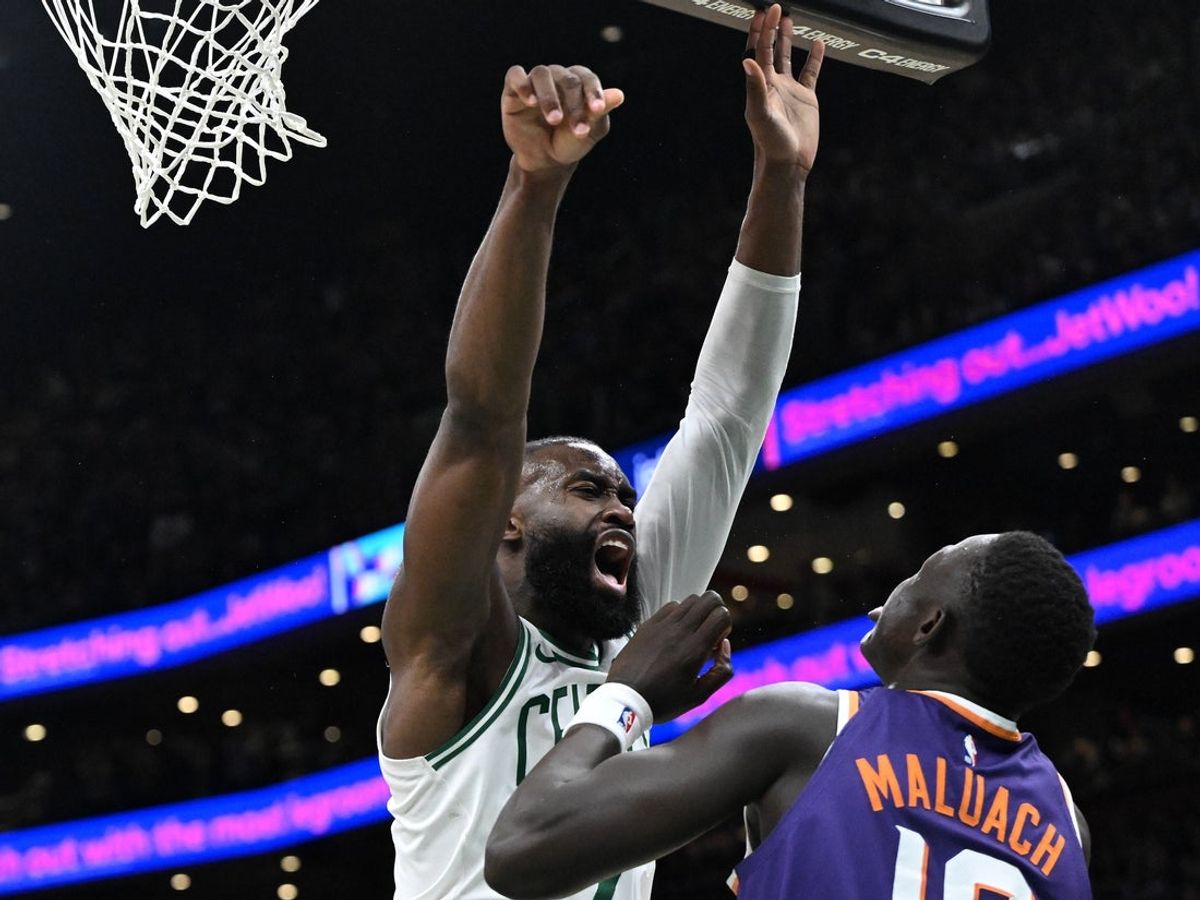 Mar 16, 2026; Boston, Massachusetts, USA; Boston Celtics guard Jaylen Brown (7) collides with Phoenix Suns center Khaman Maluach (10) during the second half at the TD Garden. Mandatory Credit: Brian Fluharty-Imagn Images